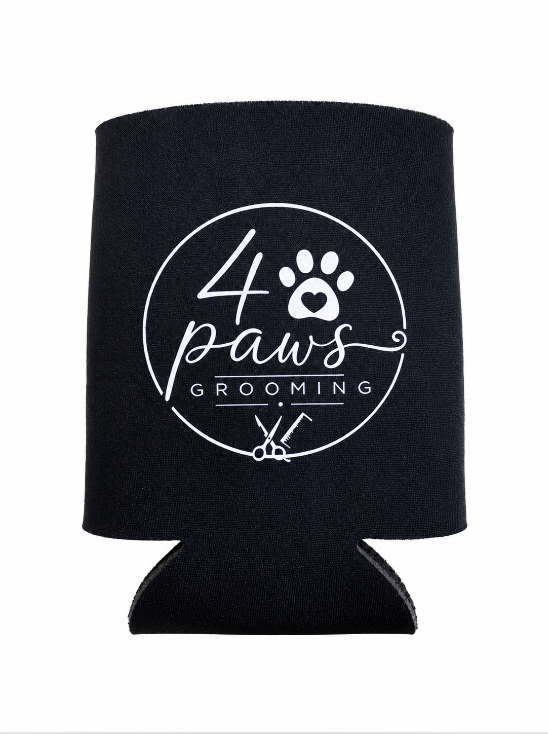 Black 4 Paws Grooming can cooler with a white circular logo featuring a heart-centered paw print, scissors, and a comb, shown on a white background.