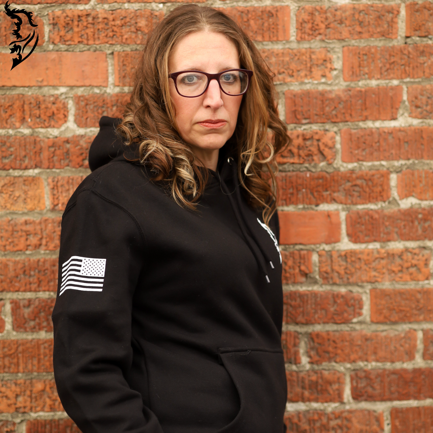 Black fleece-lined hoodie with an intricately designed eagle head and 'Freedom' text, symbolizing strength and patriotism.