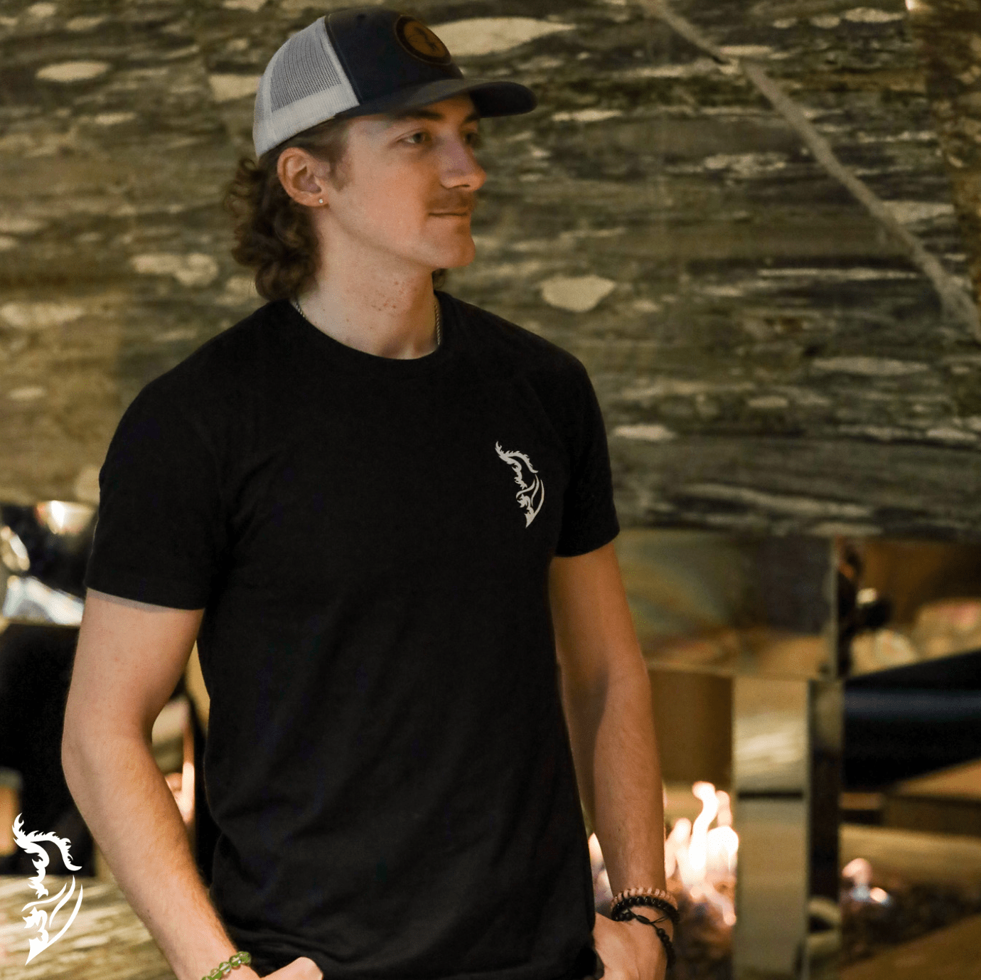 White Angel Wing Logo on front left chest