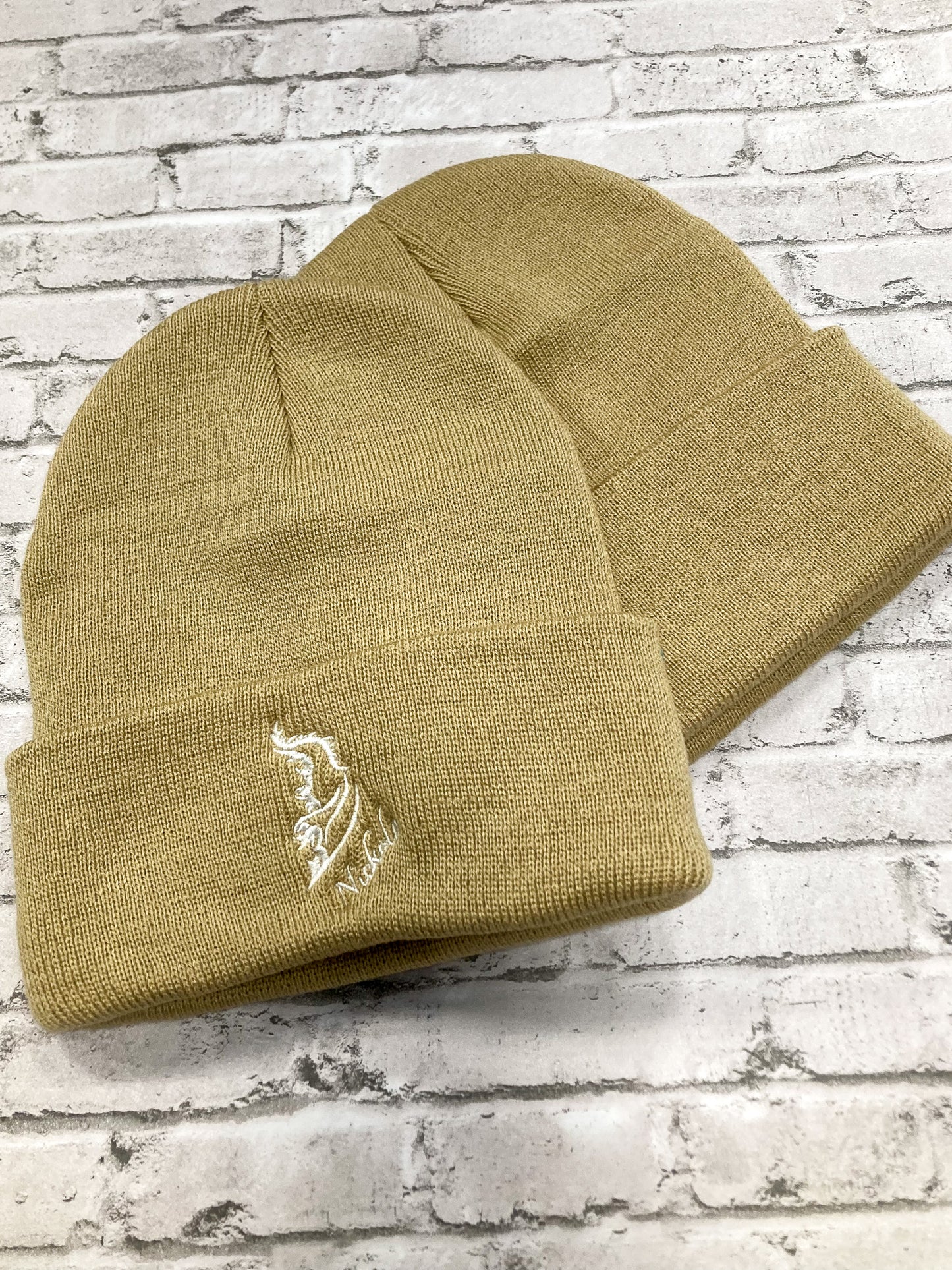 Front and back product image of a streetwear beanie camel colored, made from soft knit fabric.