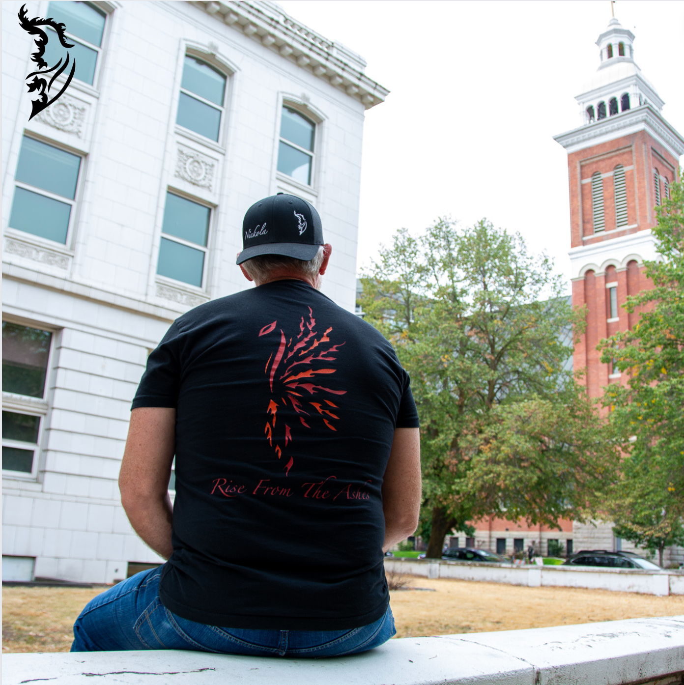 Hand-drawn Phoenix in Red, Orange and Yellow with Rise from the Ashes written below