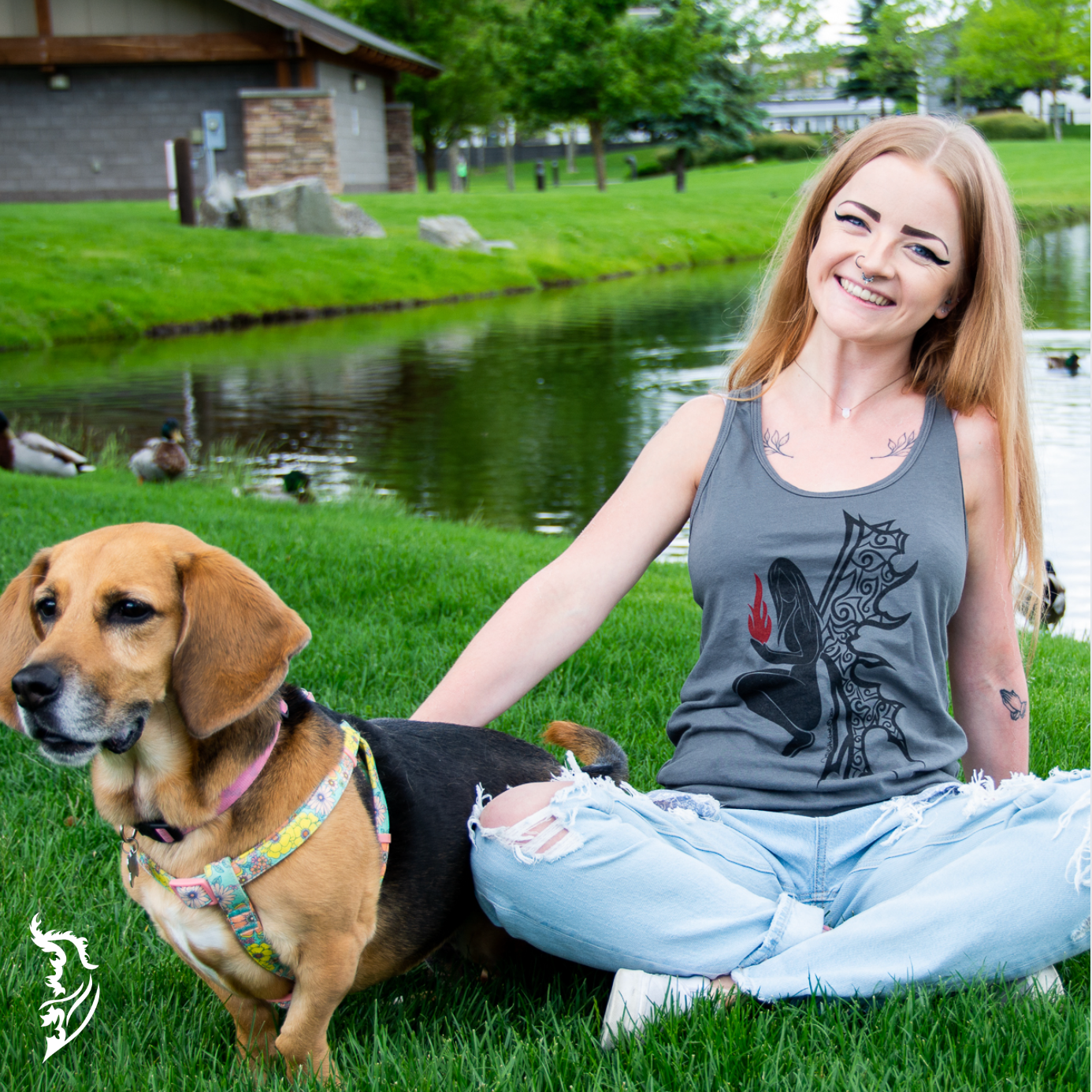 Model wearing a grey fire angel sleeveless tank top with an edgy hand-drawn design