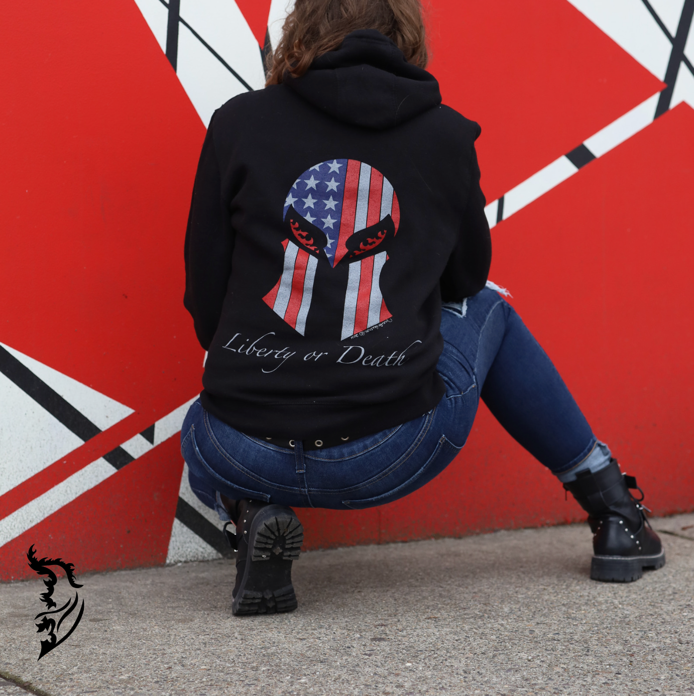 Back of a black hoodie showcasing a Spartan helmet and American flag, paired with 'Liberty or Death' text as a bold statement.