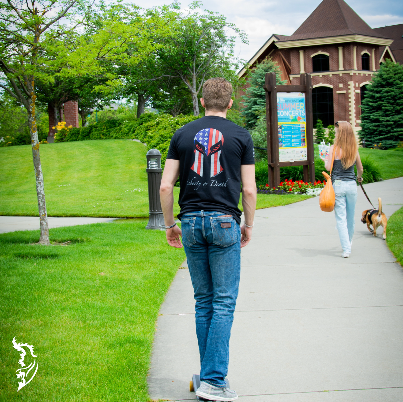 Back view of a men's tee featuring a  hand-drawn Spartan helmet masked by the American flag and 'Liberty or Death' text for a bold, patriotic statement.