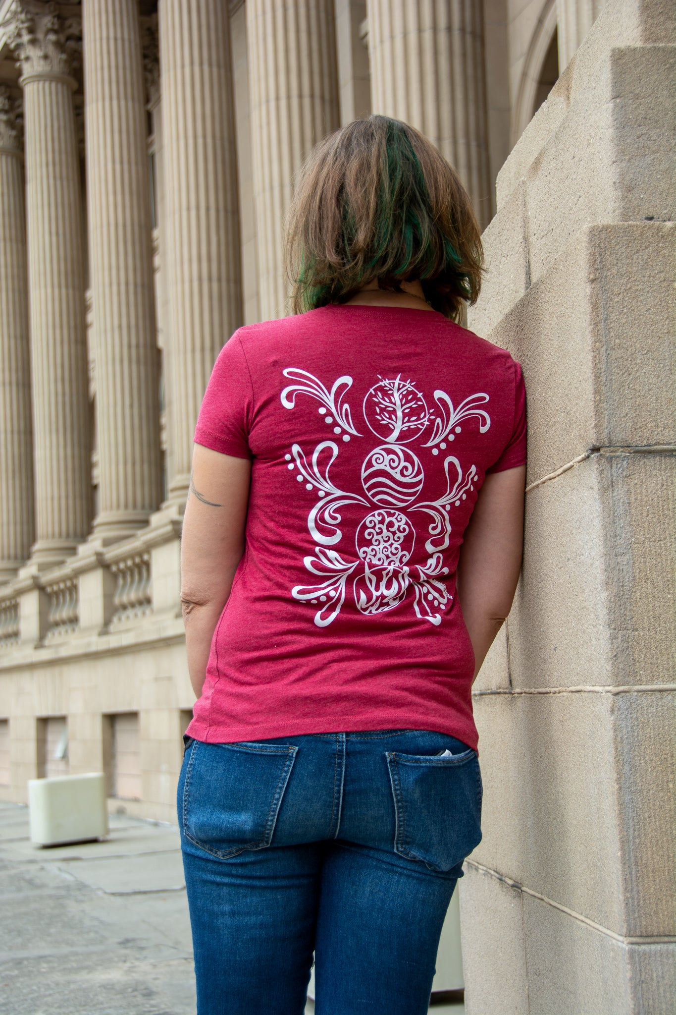 Hand-drawn Elements in white down back center of shirt