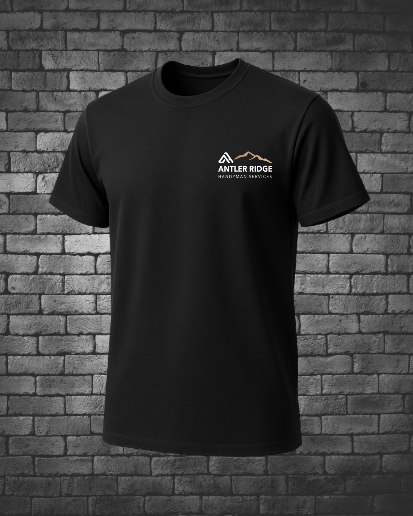 Black t-shirt with 'Antler Ridge Handyman Services' logo against a brick wall.