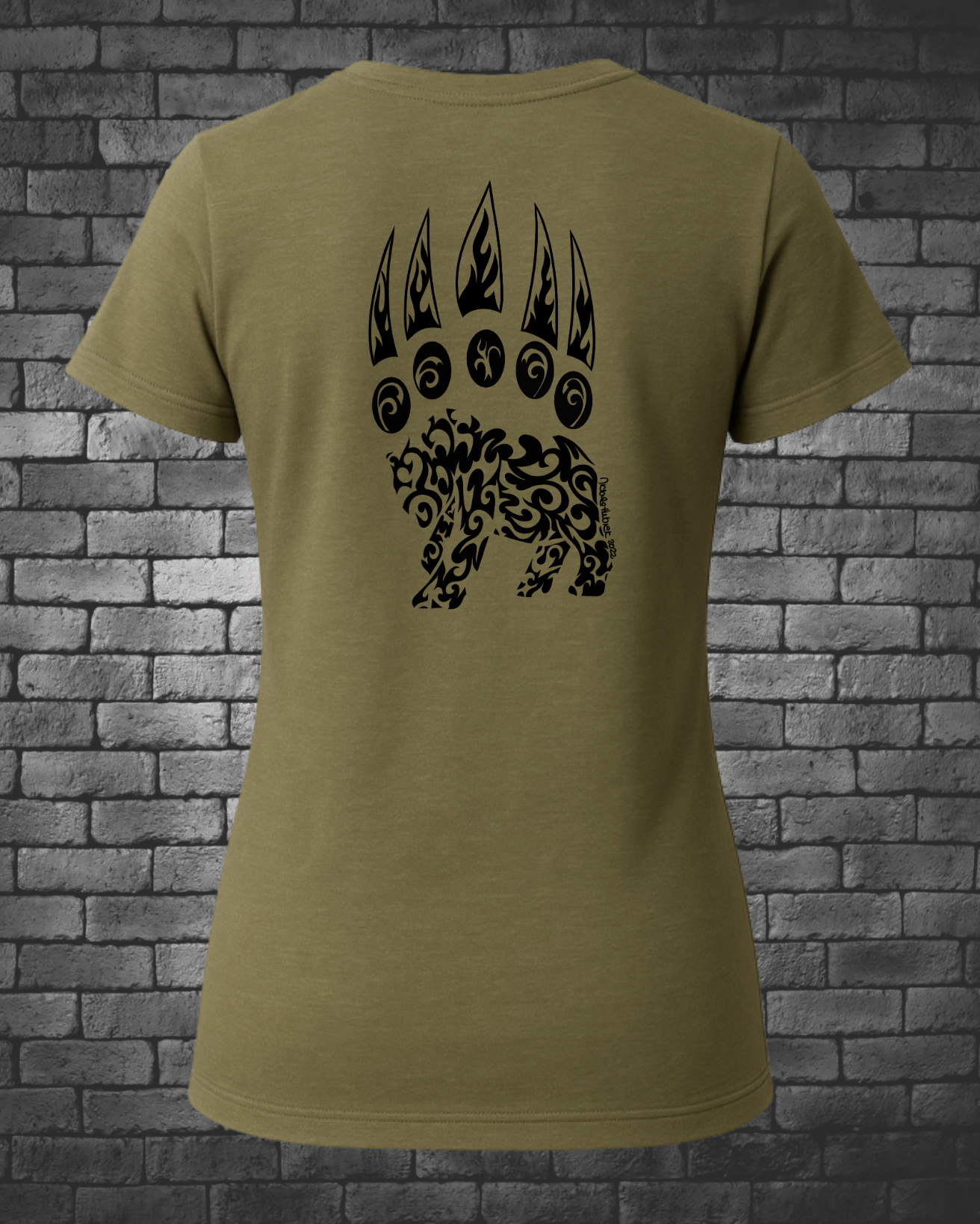 Hand-drawn bear paw with tribal bear in bottom of paw