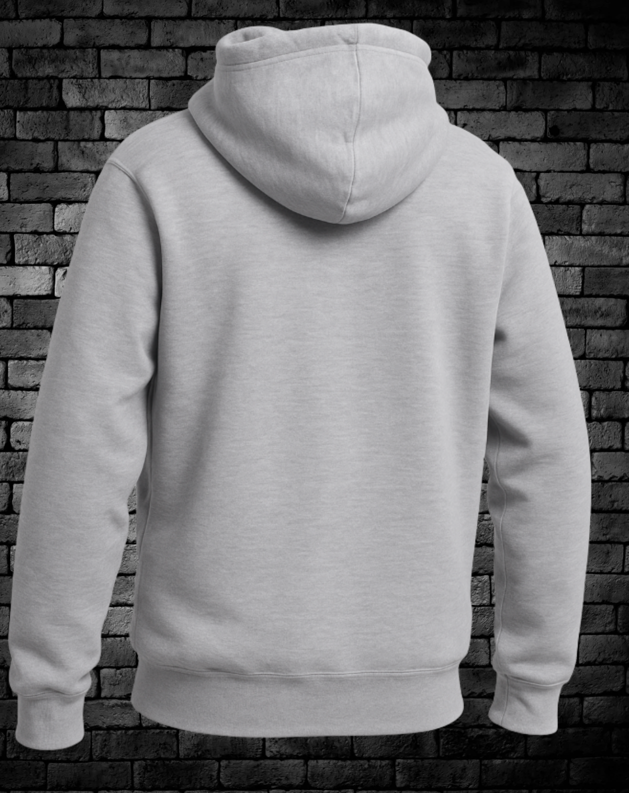 Gray hoodie with a brick wall background