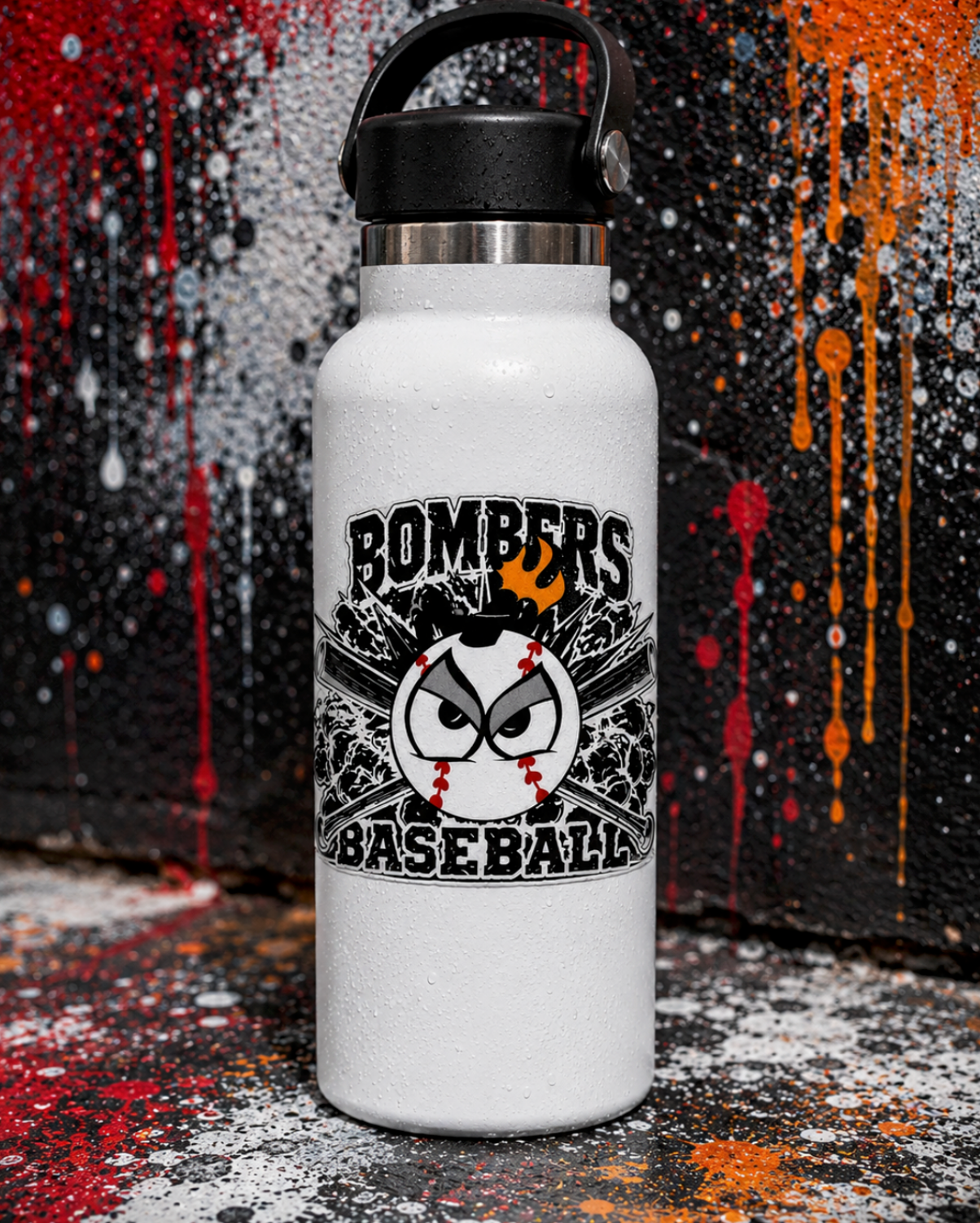 White insulated water bottle featuring a borderless Bombers Baseball UV sticker with a fierce baseball mascot design, photographed in an urban graffiti-inspired setting with dramatic paint drip textures.