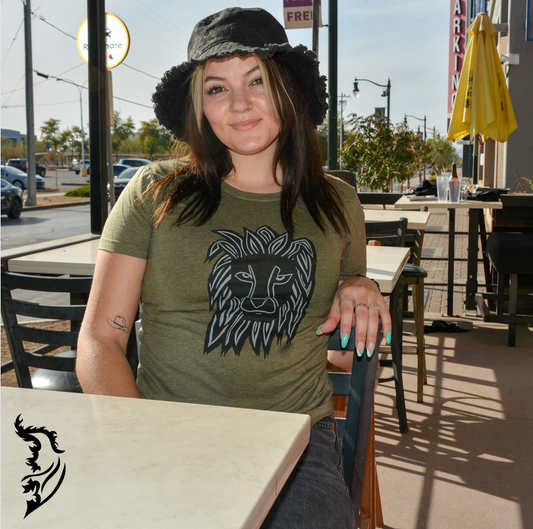 Unleash your inner strength with the Courage Lion Ladies T-Shirt. Featuring a striking, hand-drawn lion design inspired by the empowering quote, "5 seconds of courage can change your life," this tee is more than just a piece of clothing—it's a daily reminder to face life with bravery and confidence. Crafted locally in Spokane, WA, this custom-made T-shirt brings an exclusive touch to your wardrobe. Perfect for tackling challenges or simply making a bold statement.