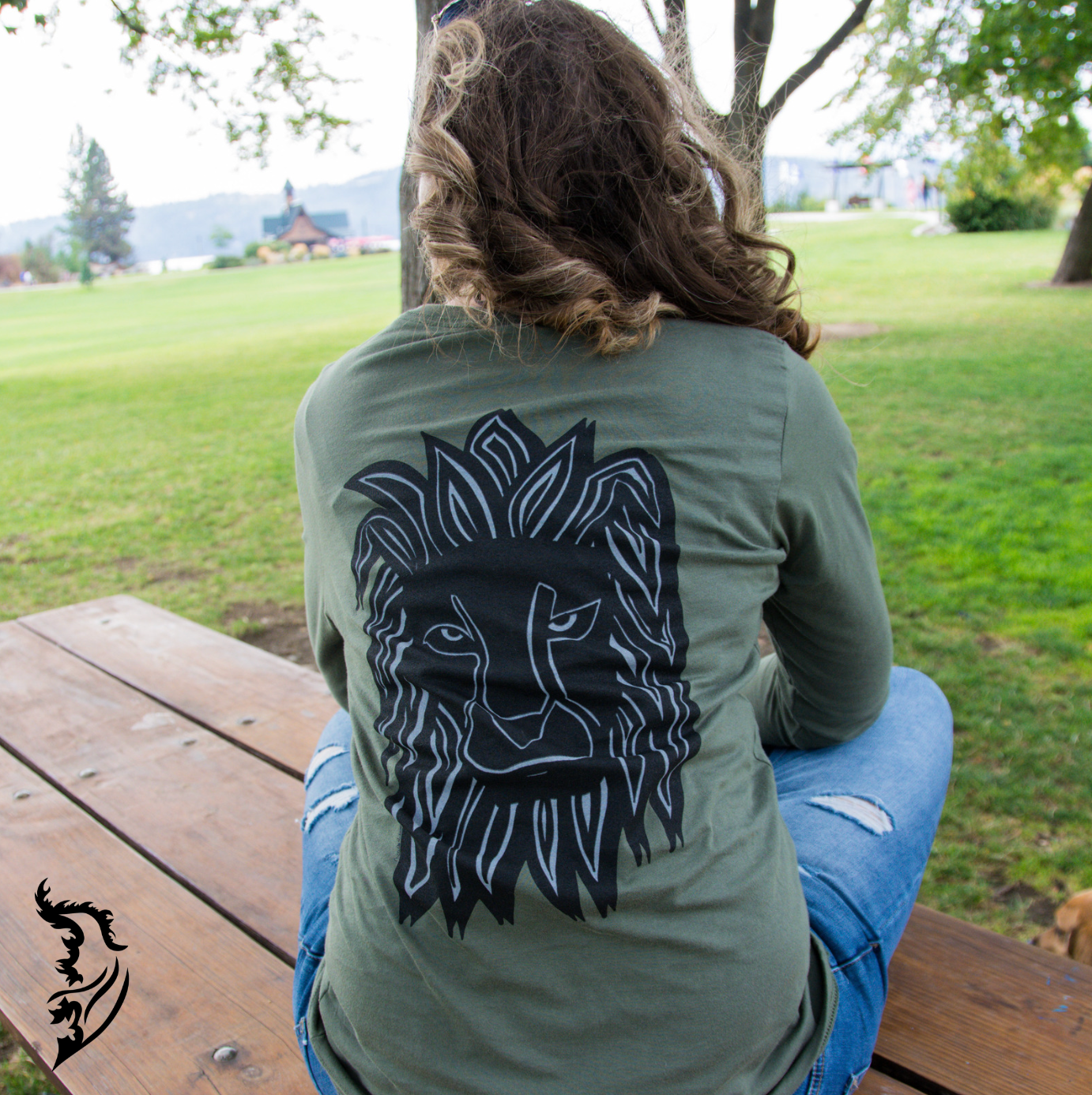 Courage Lion Long Sleeve featuring hand-drawn art of a bold lion paired with an inspirational quote. Perfect for those seeking confidence boost and art-inspired clothing. Showcase of stylish and motivational appare