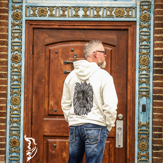 A hand-drawn Courage Lion Hoodie featuring bold, inspirational art, designed to boost confidence and reflect bravery. Perfect for showcasing art-inspired clothing and motivational apparel.