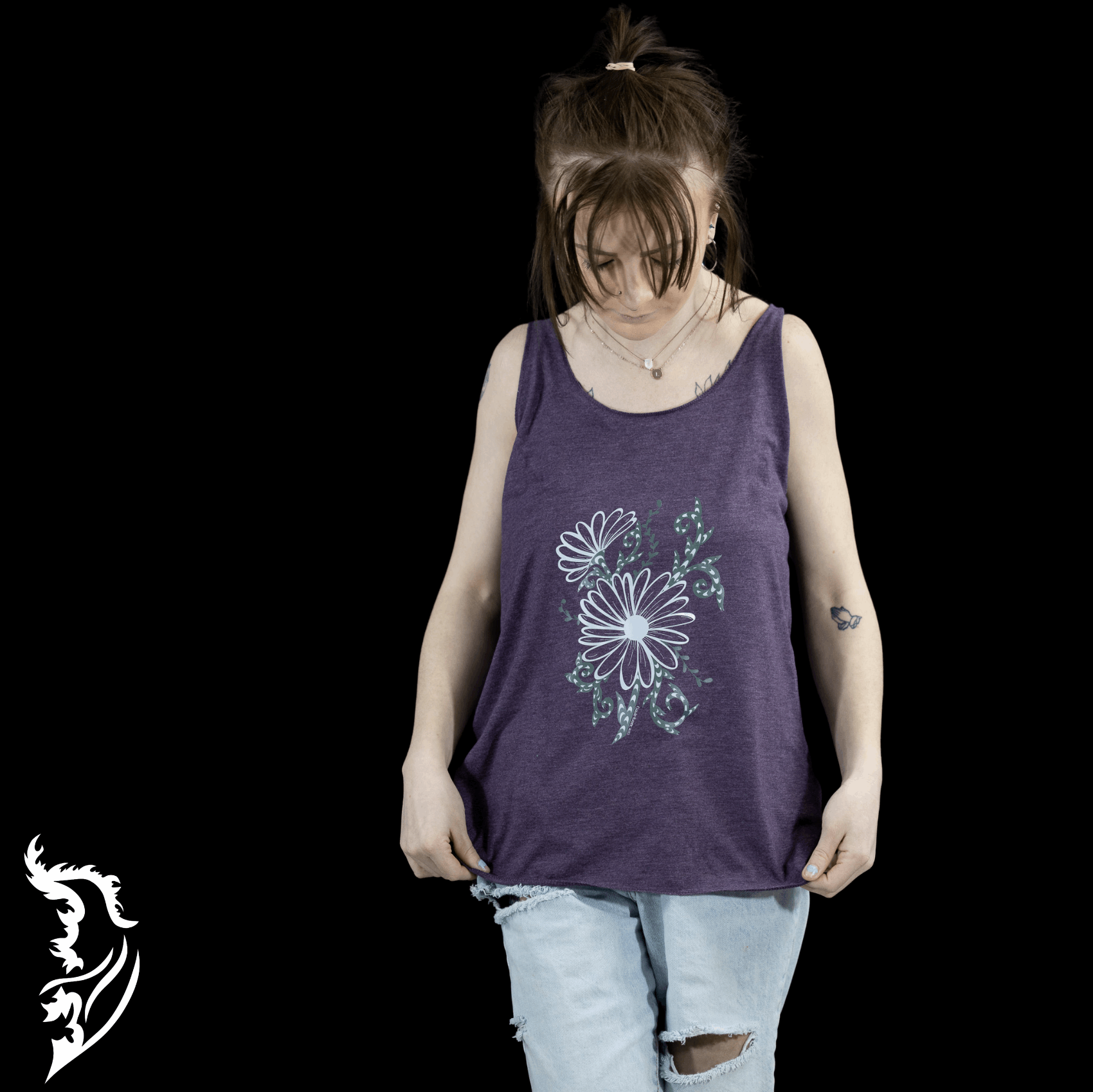 Woman wearing a purple tank top featuring a hand-drawn daisy  design with green vine accents by Street Style by Nickola