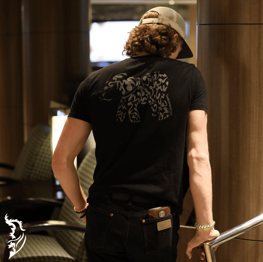 Hand-drawn Tribal Elephant in grey on back of black t-shirt