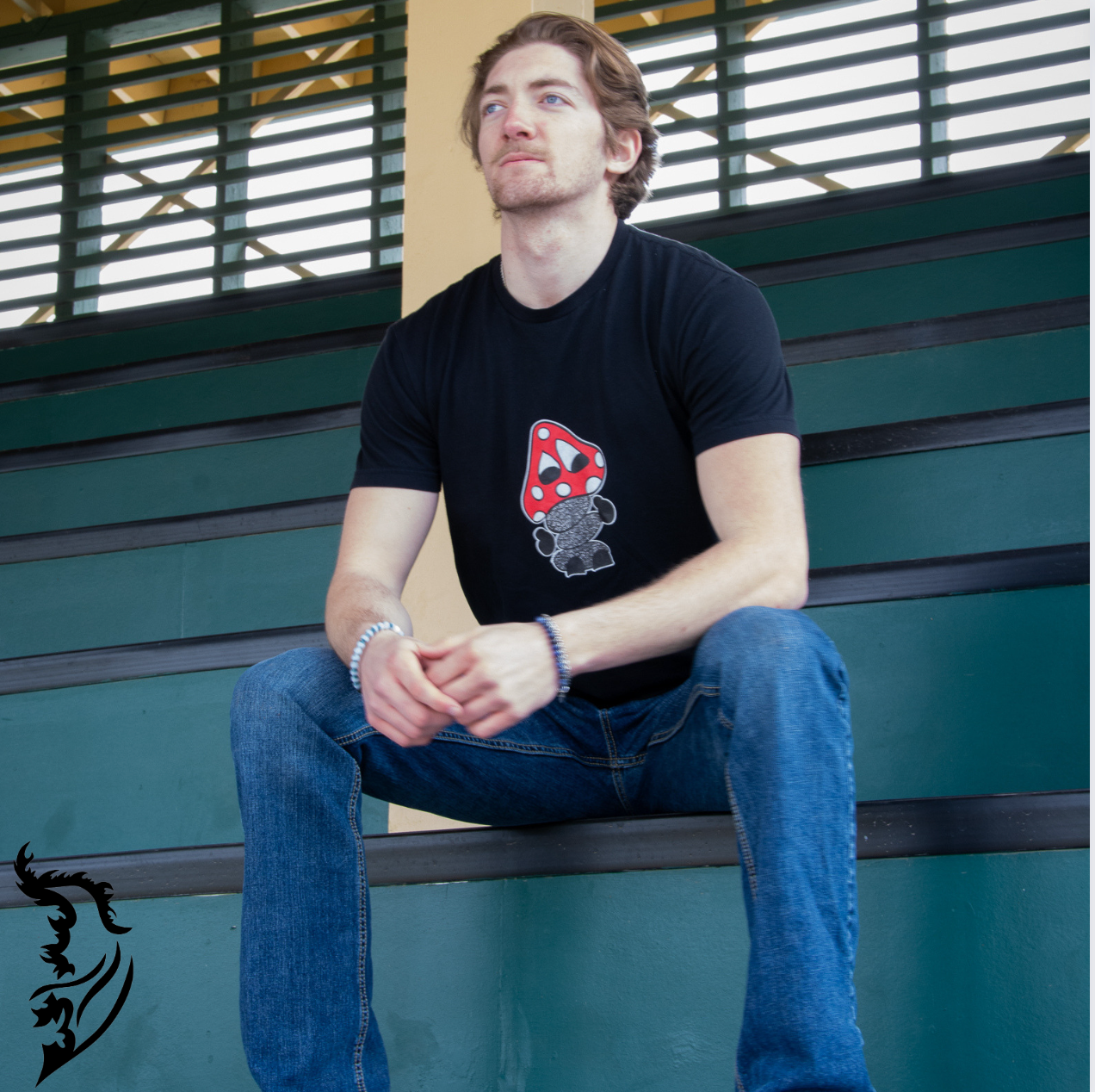 Hand-drawn playful mushroom on front center of black T-Shirt