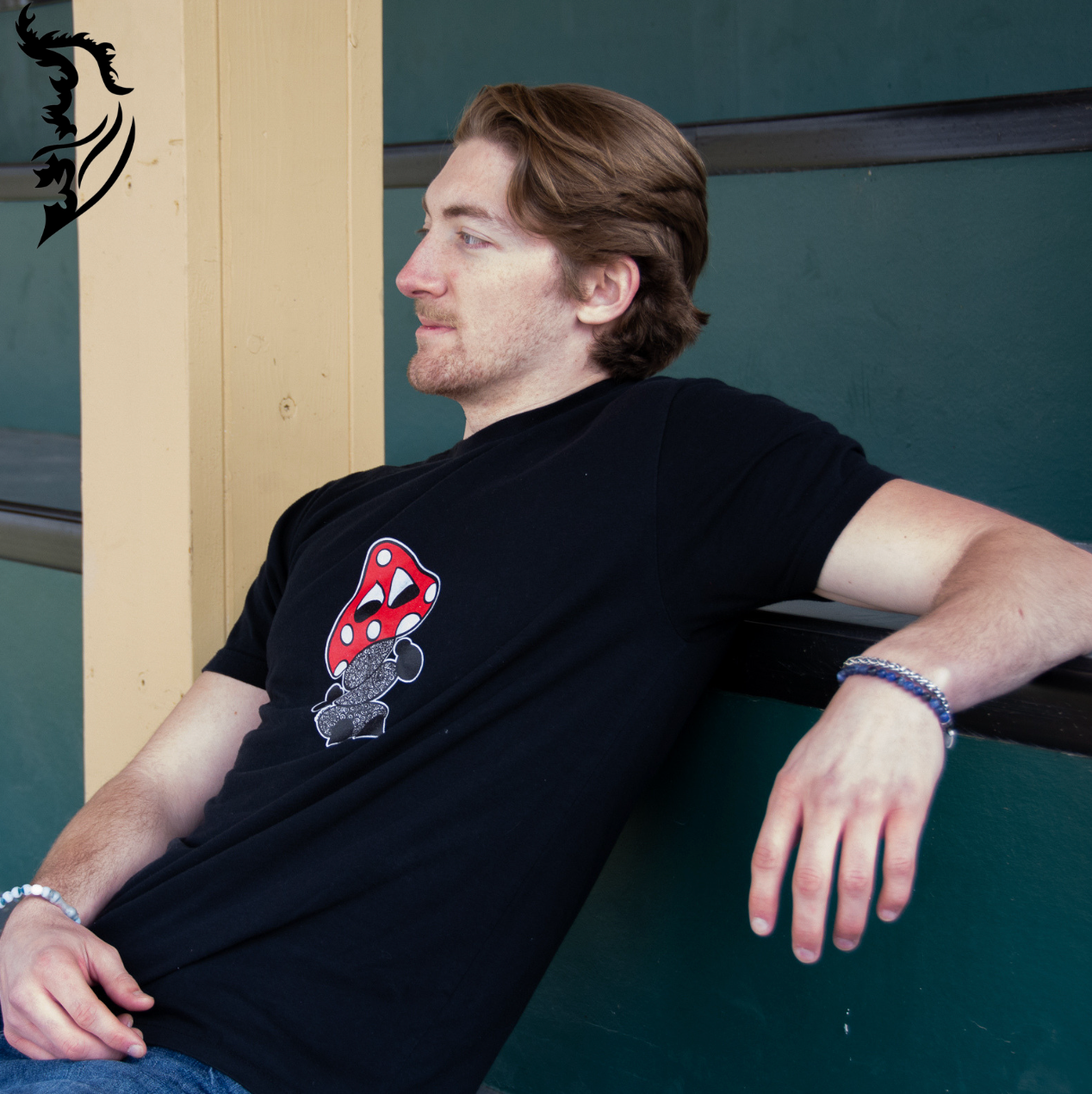 Hand-drawn playful mushroom on front center of black T-Shirt