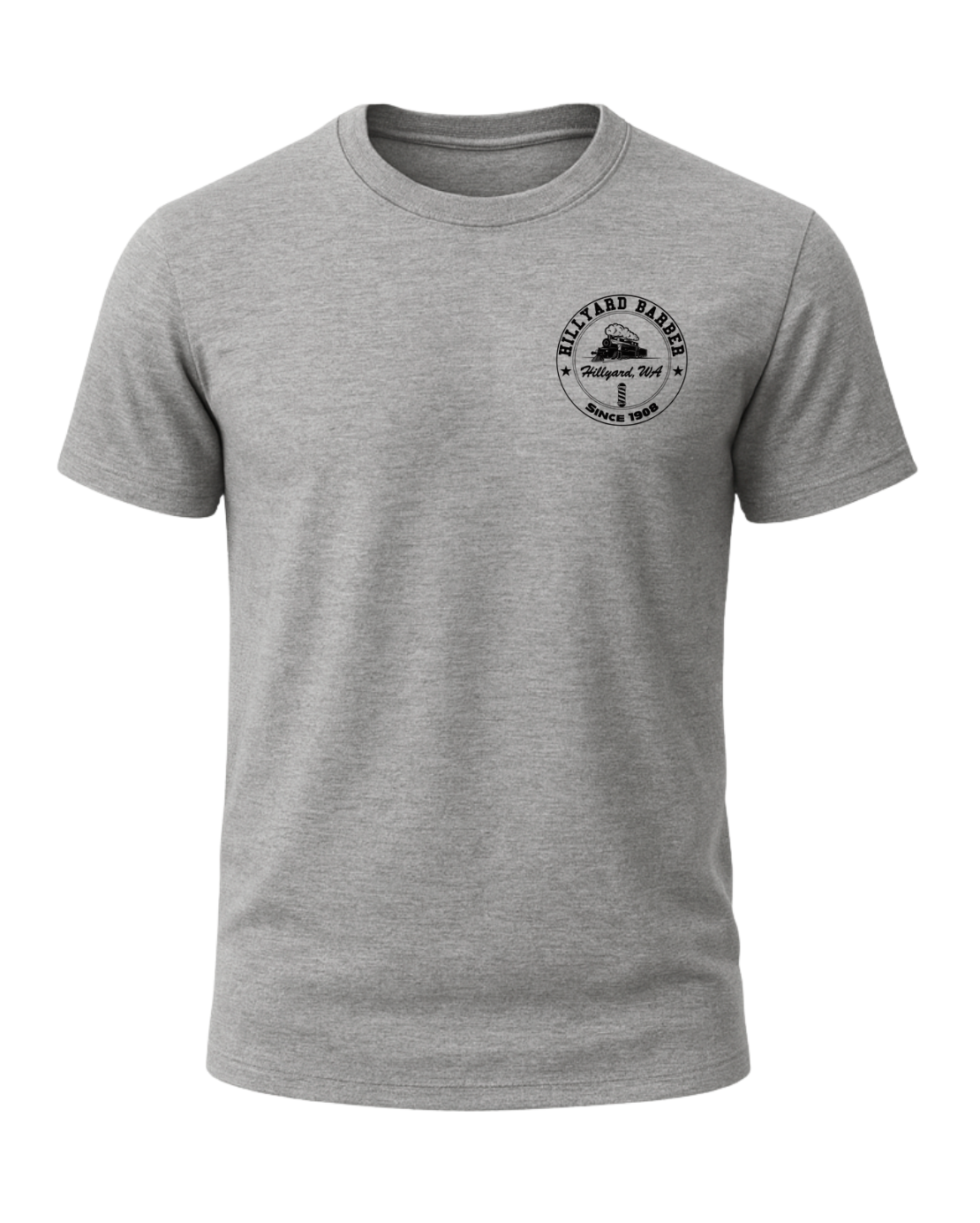 A heather grey T-Shirt shown from the front.A circular black logo graphic  reading 'HILLYARD BARBER' around the top and 'SINCE 1908' around the bottom, with a vintage train illustration and a barbershop pole in the center. The text 'Hillyard, WA' appears across the middle.