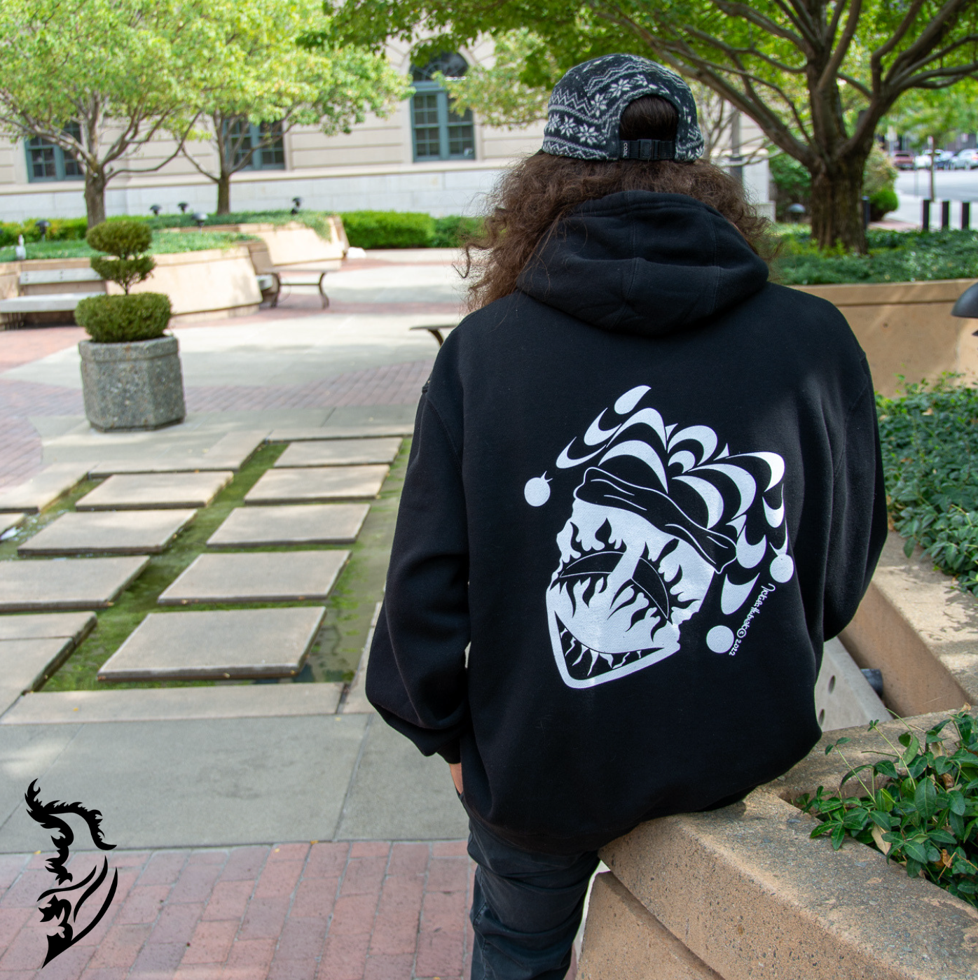 Male Model wearing Joker Hoodie at a park