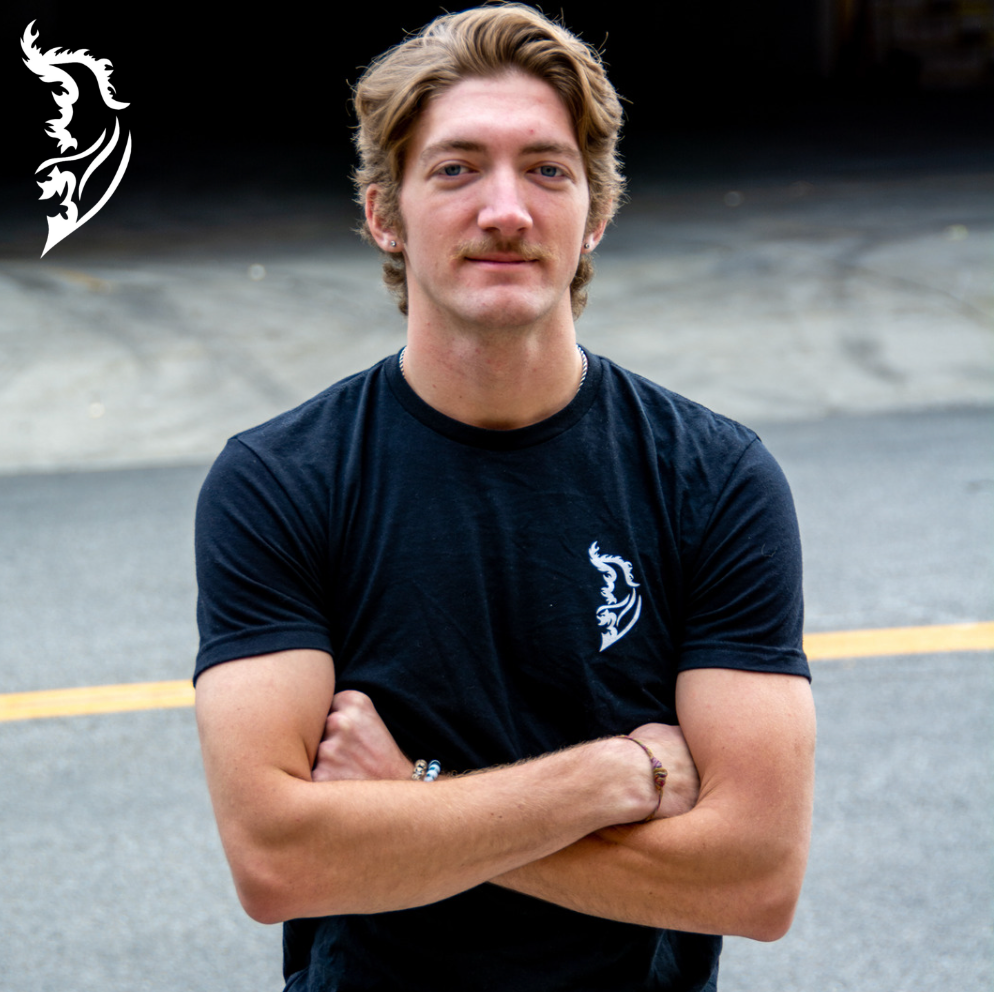 White Angel Wing Logo on front left chest of black T-Shirt