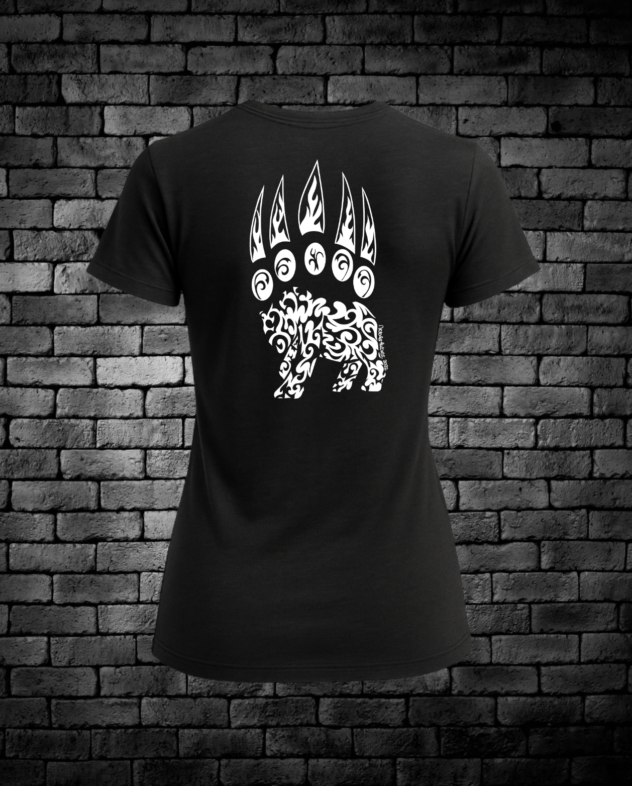 White Hand-drawn bear paw with tribal bear in bottom of paw