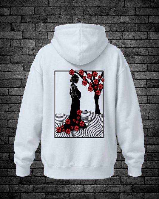 White hoodie featuring a hand-drawn black silhouette of a woman standing beneath a cherry blossom tree with vibrant red flowers and flowing wave patterns. Original symbolic streetwear artwork by Street Style by Nickola.