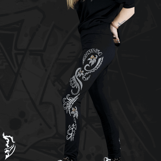 Model Wearing Lily Leggings showing Hand-drawn Lily design left side of leg