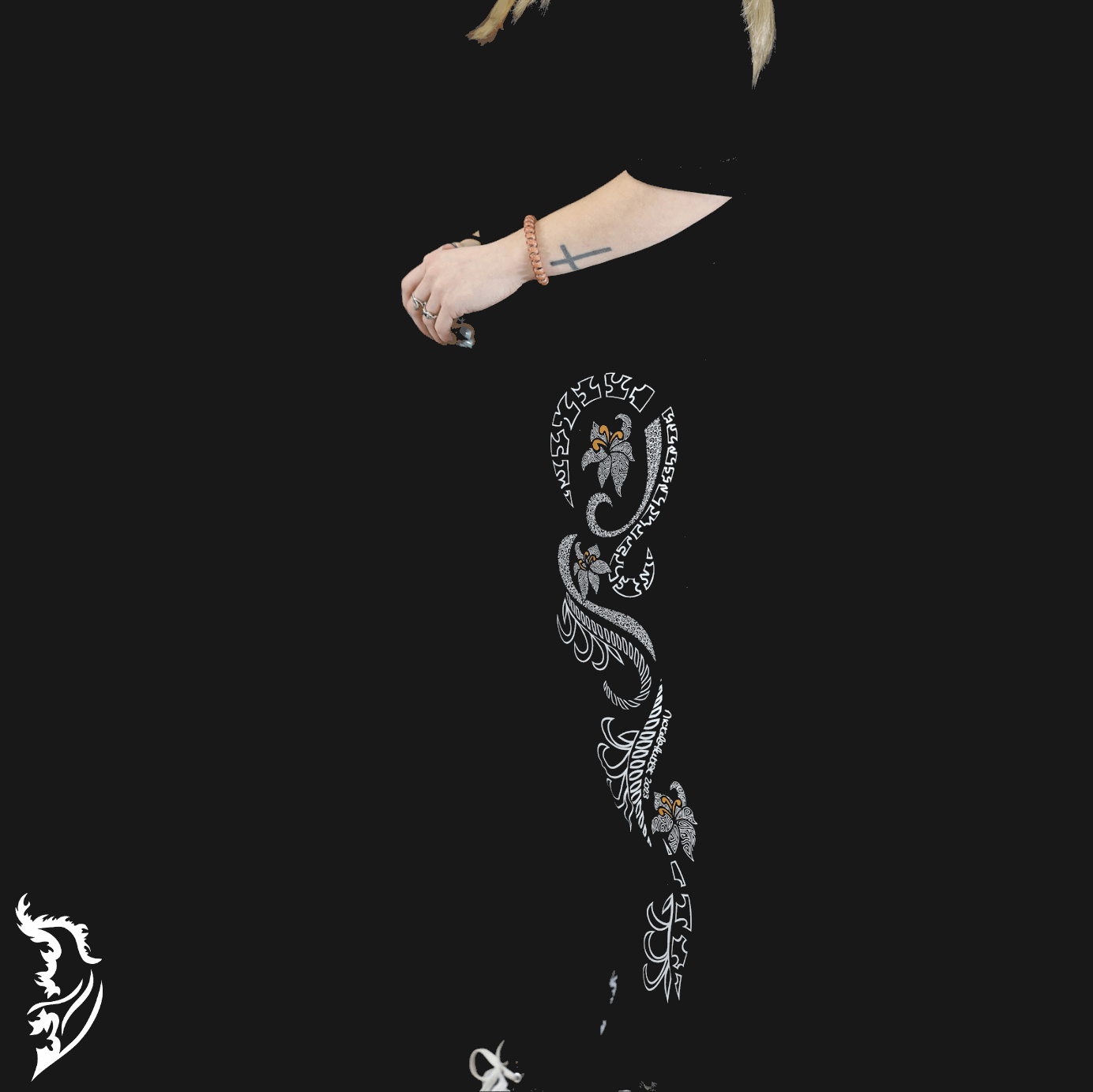 Model Wearing Lily Leggings showing Hand-drawn Lily design left side of leg