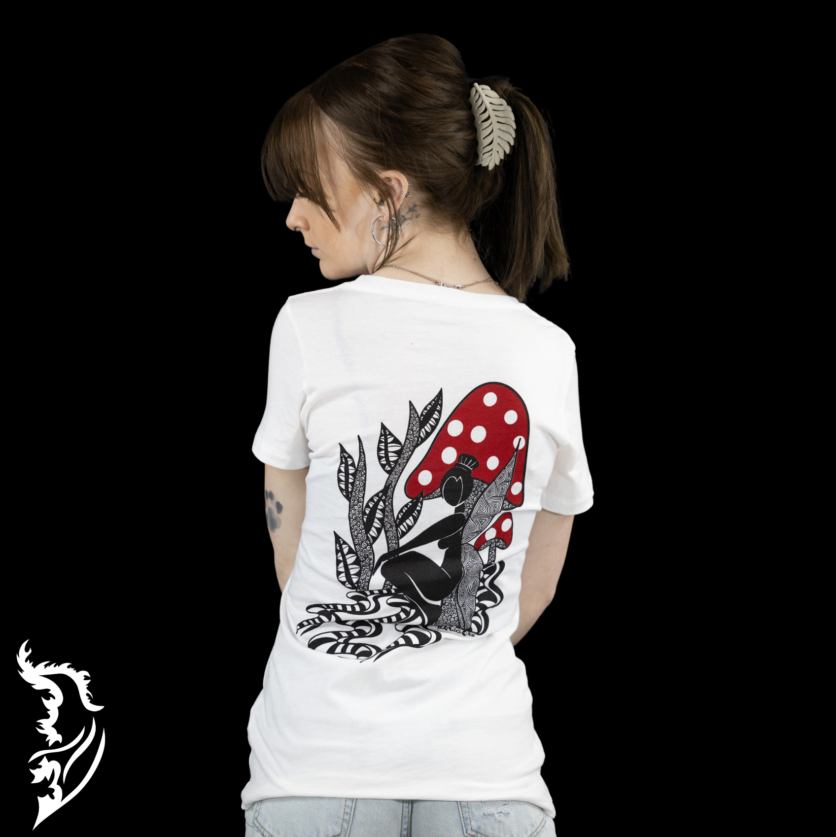 Add a touch of whimsy to your wardrobe with the Fairy Mushroom Ladies T-Shirt—a wearable piece of art that inspires wonder and imagination. Featuring hand-drawn, locally crafted designs, this t-shirt is more than just clothing; it's a celebration of creativity and the magic within everyday life. Whether you're wandering through nature or simply adding a spark to your daily outfit, the enchanting fairy and mushroom artwork evokes a sense of hope and limitless possibilities. 