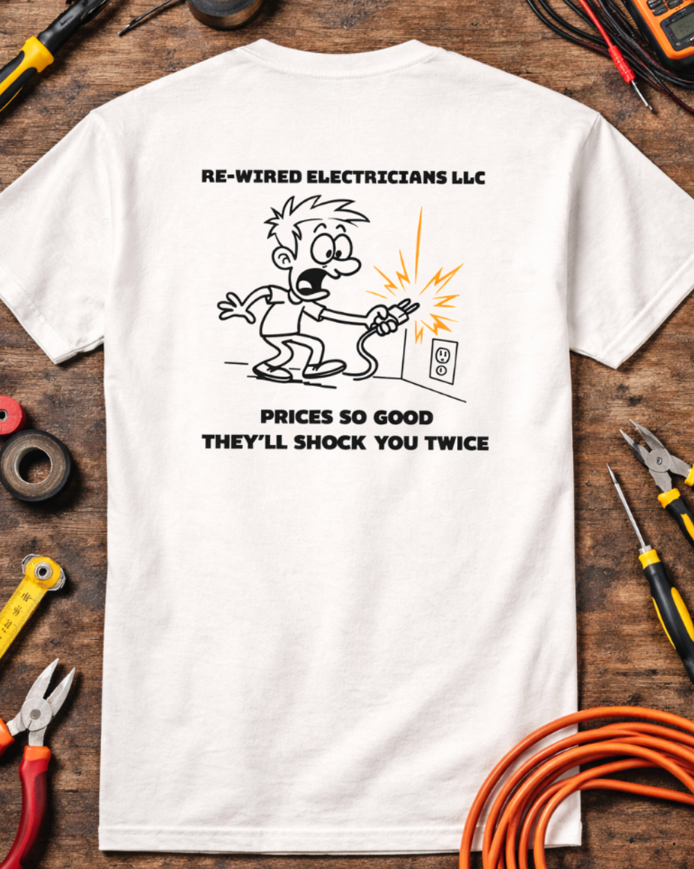 Re-Wired Electricians LLC funny electrician t-shirt laid flat on workbench with tools and extension cord