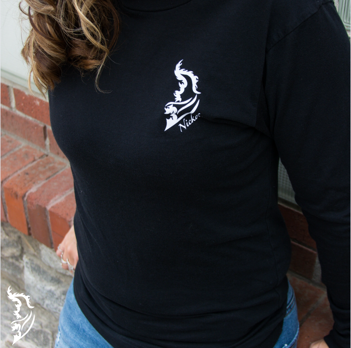 White Angel Wing Logo on front left chest