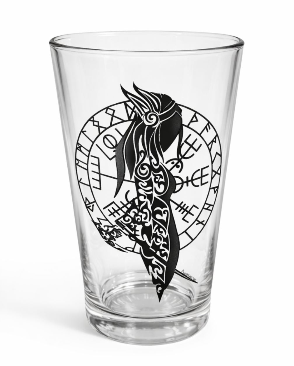 Clear pint glass with hand-drawn  black Norse shield maiden silhouette and rune circle design, displayed against a clean white background.