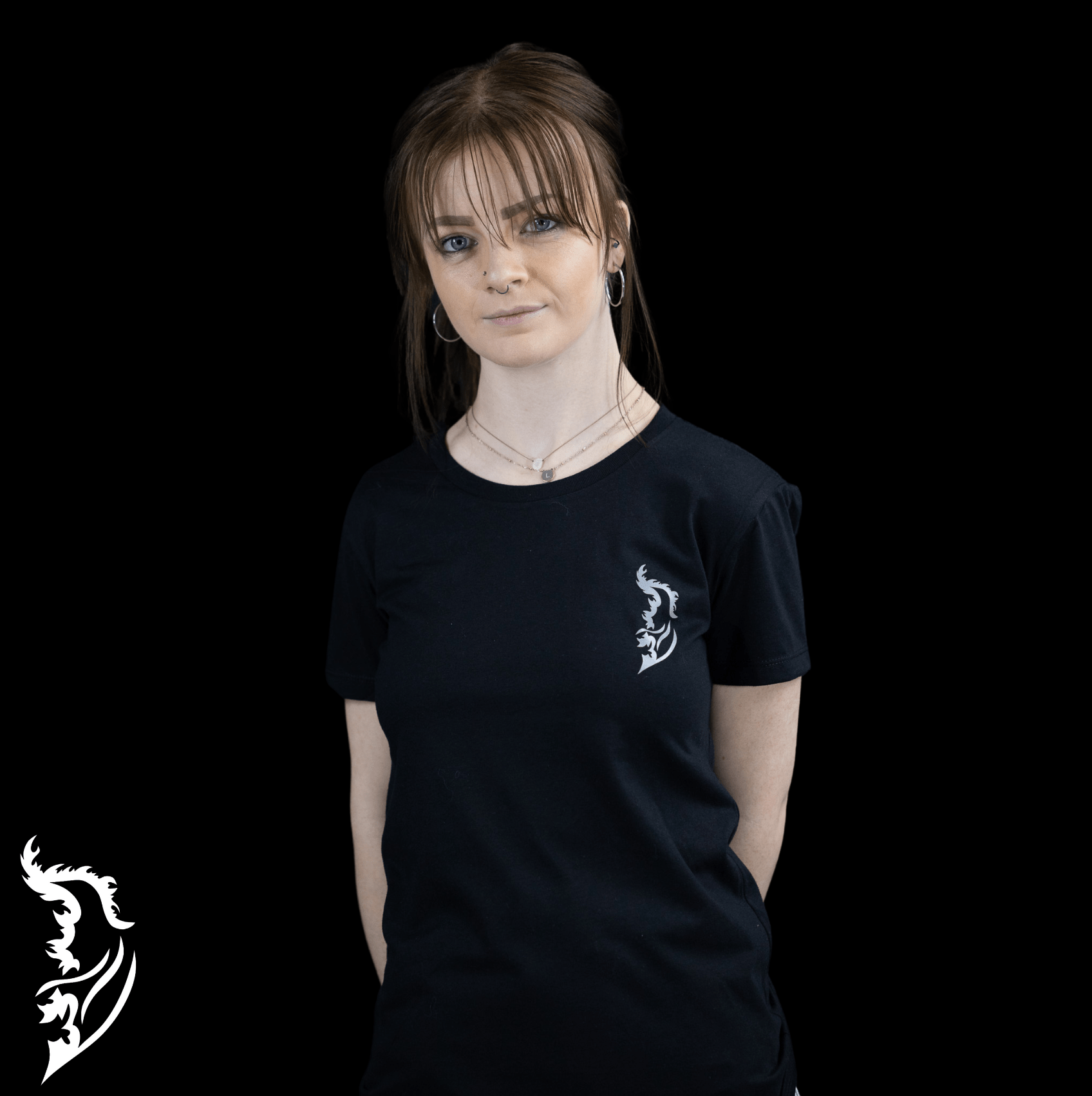 White Angel Wing Logo on front left chest on black fitted ladies t-shirt