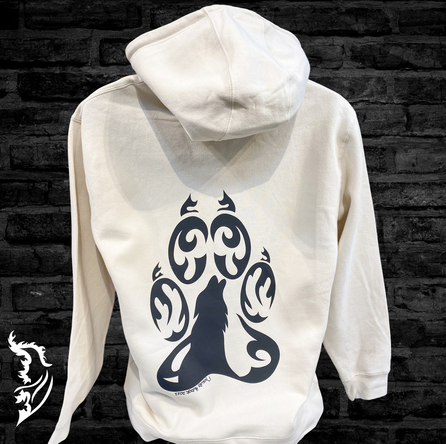 A hand-drawn fleece hoodie featuring an intricately designed wolf graphic, symbolizing courage, wisdom, and confidence,.