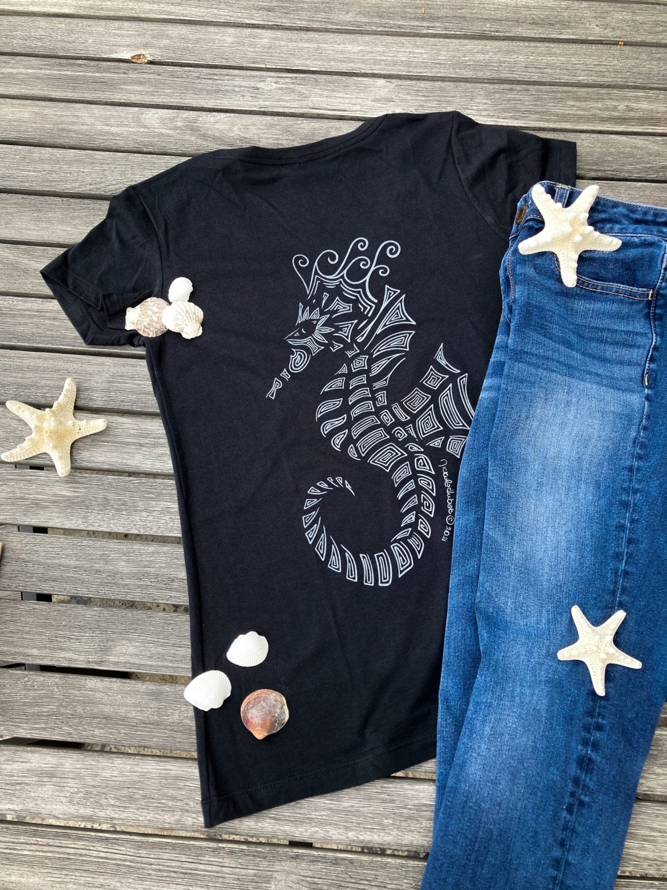 Hand-drawn lined Seahorse in grey on the front