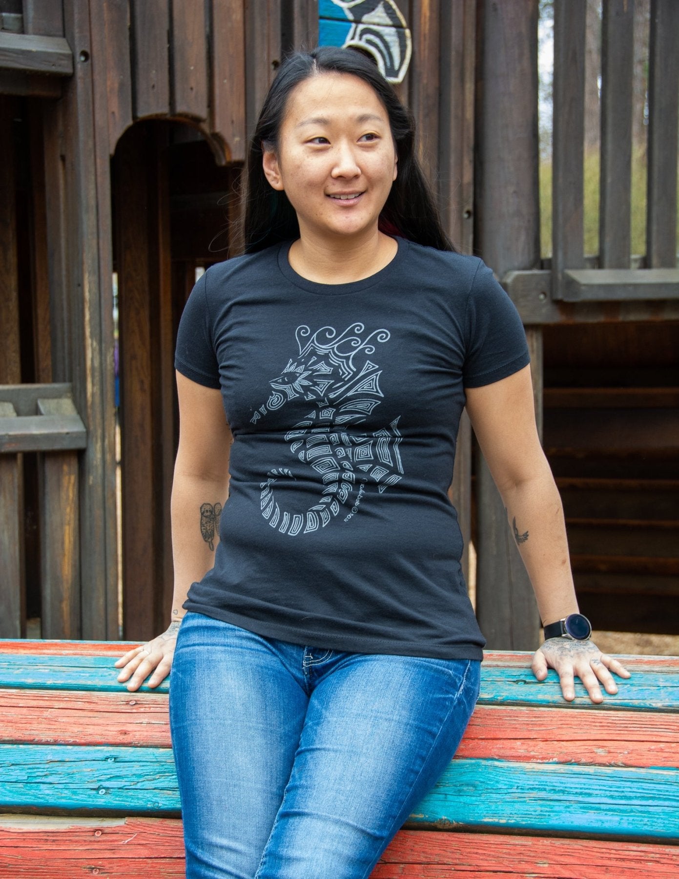 Hand-drawn lined Seahorse in grey on the front